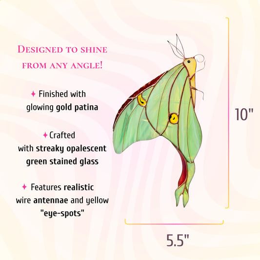 This handcrafted stained glass luna moth features streaky green opalescent glass and measures 10 inches tall by 5.5 inches wide.