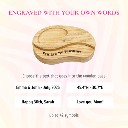 This personalization infographic highlights the option to engrave custom words, names, special dates, or coordinates onto the solid wood base, making it a unique and deeply meaningful gift.