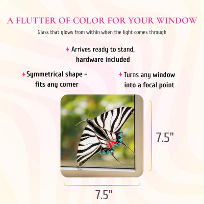 Zebra swallowtail stained glass window corner, 7.5 by 7.5 inches, shown in a window corner. Text: a flutter of color for your window, glass that glows from within when the light comes through. Arrives ready to stand with hardware included, its symmetrical shape fits any corner and turns any window into a focal point.