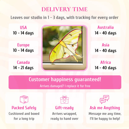 Delivery info for the luna moth stained glass window corner, pictured in a window. Ships from the studio in 1-3 days with tracking. Delivery: USA and Europe 10-14 days, Canada 14-21 days, Australia, Asia and Africa 14-40 days. If it arrives damaged, it is replaced for free. Cushioned and boxed for the trip, arrives gift-wrapped, and you can message the maker any time.