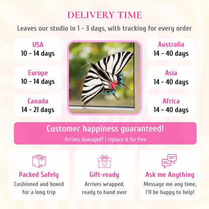 Delivery info for the zebra swallowtail stained glass window corner, pictured in a window. Ships from the studio in 1-3 days with tracking. Delivery: USA and Europe 10-14 days, Canada 14-21 days, Australia, Asia and Africa 14-40 days. If it arrives damaged, it is replaced for free. Cushioned and boxed for the trip, arrives gift-wrapped, and you can message the maker any time.