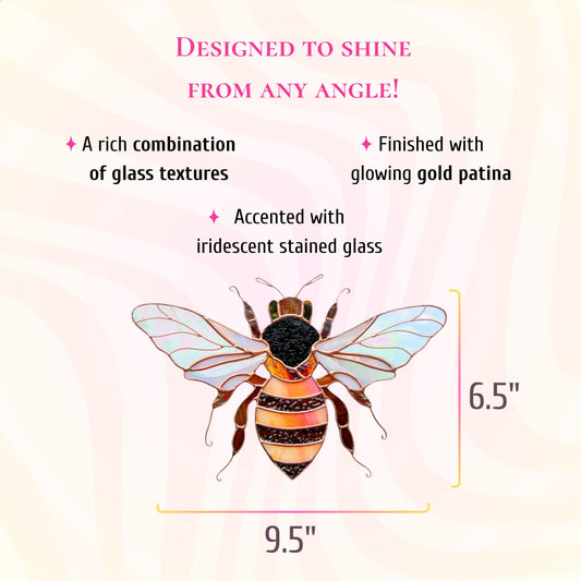 This handcrafted stained glass bee features a rich combination of textures, glowing gold patina, and measures 9.5 inches by 6.5 inches.