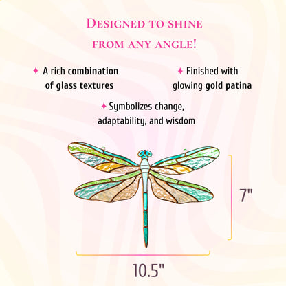 This dimensions infographic indicates the stained glass dragonfly measures 10.5 inches high by 7 inches wide, finished with gold patina.