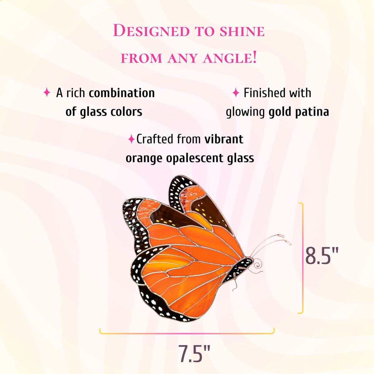 An orange and black butterfly stained glass wall art piece on a pale pink background with descriptive text and dimension labels showing 7.5 inches wide by 8.