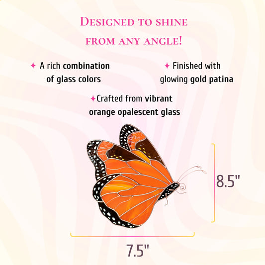 An orange and black butterfly stained glass wall art piece on a pale pink background with descriptive text and dimension labels showing 7.5 inches wide by 8.