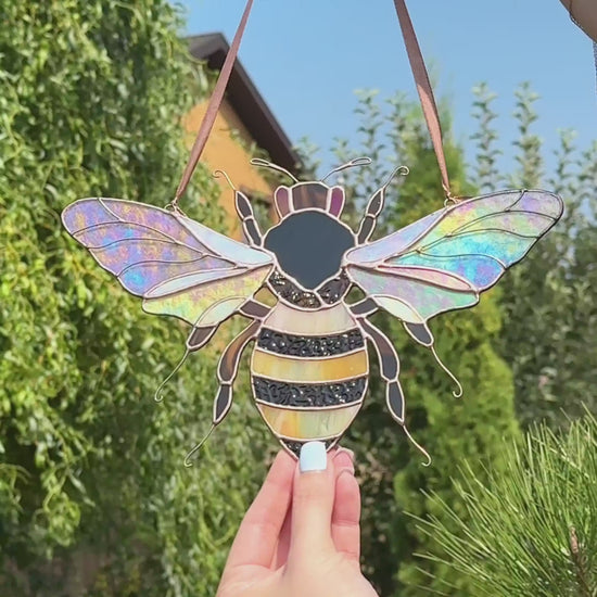 Video of stained glass bumble bee suncatcher with iridescent stained glass wings