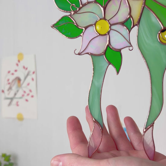 A charming video highlighting a unique stained glass luna moth suncatcher, focusing on its exquisite artistry and ability to add a touch of magic to your favorite space.