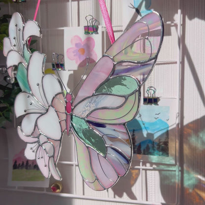 A charming video highlighting a unique stained glass butterflu with lily flowers, focusing on its exquisite artistry and ability to add a touch of magic to your favorite space.
