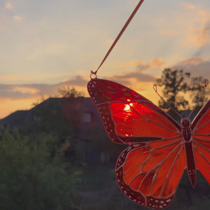 A charming video highlighting a unique stained glass monarch butterfly suncatcher, focusing on its exquisite artistry and ability to add a touch of magic to your favorite space.